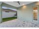View of a covered lanai area with access to the backyard and other outdoor features at 4320 Vasco St, Punta Gorda, FL 33950