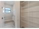 Laundry room featuring utility sink and walk in pantry with wire shelving at 4320 Vasco St, Punta Gorda, FL 33950