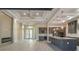 An open floor plan combining the kitchen and living area with modern finishes and light wood flooring at 4320 Vasco St, Punta Gorda, FL 33950