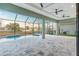 Covered patio and screened-in pool overlooking waterfront at 4320 Vasco St, Punta Gorda, FL 33950