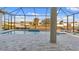 Screened in pool and spa overlooking the canal, with waterfront views at 4320 Vasco St, Punta Gorda, FL 33950