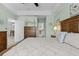 Bright main bedroom boasts coastal decor, en-suite access, and soft green walls at 5783 Sabal Trace Dr # 103B57, North Port, FL 34287