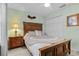 Comfortable bedroom showcasing a large bed, neutral walls, and ample closet space at 5783 Sabal Trace Dr # 103B57, North Port, FL 34287