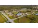 Scenic aerial view of a community with modern homes, lush greenery and neighborhood streets at 7363 N Moss Rose, Punta Gorda, FL 33955