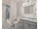 Modern bathroom features a gray vanity with marble countertop and a glass shower at 7363 N Moss Rose, Punta Gorda, FL 33955