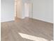 Bedroom featuring tile floors and a view of the home's entryway at 8604 Shore Lake Dr, Englewood, FL 34224