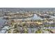 This aerial showcases waterfront real estate, with private boat docks and convenient access to the water and canals at 1303 Casey Key Dr, Punta Gorda, FL 33950