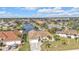 Desirable canal-front home with manicured lawn, tile roof, and convenient water access for boating enthusiasts at 1303 Casey Key Dr, Punta Gorda, FL 33950