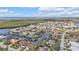 This eye-level capture provides an aerial perspective of a residential community at 1303 Casey Key Dr, Punta Gorda, FL 33950