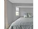 Bedroom with two built-in windows above the headboard at 1303 Casey Key Dr, Punta Gorda, FL 33950