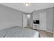 Neutral bedroom with wood floors and two closets at 1303 Casey Key Dr, Punta Gorda, FL 33950