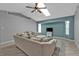 Bright living room with a vaulted ceiling, ceiling fan, and tv at 1303 Casey Key Dr, Punta Gorda, FL 33950
