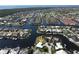Aerial view of property in a waterfront community with canals and luxurious homes at 1407 Waxwing Ct, Punta Gorda, FL 33950