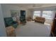 Bright living room with multiple seating options and tranquil waterfront views at 1407 Waxwing Ct, Punta Gorda, FL 33950