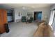 Spacious living room boasts neutral carpet and a large picture window at 1407 Waxwing Ct, Punta Gorda, FL 33950