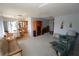 Open floor plan flows from living room into a dining area and updated kitchen at 1407 Waxwing Ct, Punta Gorda, FL 33950