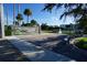 Peaceful memorial park with a brick pathway, benches, a fountain, and a mural, set against a clear blue sky at 1407 Waxwing Ct, Punta Gorda, FL 33950