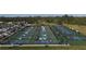 Aerial image highlighting multiple outdoor pickleball courts, showing a vibrant community enjoying active recreation at 1407 Waxwing Ct, Punta Gorda, FL 33950