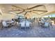 Spacious outdoor bar and dining area with comfortable seating and a relaxed atmosphere at 14071 Heritage Landing Blvd # 325, Punta Gorda, FL 33955