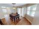 Formal dining room with a view to the entry way and the pool at 1492 Kolenda St, Port Charlotte, FL 33952