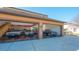 Spacious three-car garage with multiple classic cars parked inside at 1525 Hinton St, Port Charlotte, FL 33952