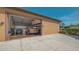 Spacious garage featuring multiple classic cars and ample parking space at 1525 Hinton St, Port Charlotte, FL 33952