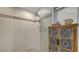 Stylish shower featuring white tile, decorative accent tile, mosaic floor, and a glass door at 1525 Hinton St, Port Charlotte, FL 33952