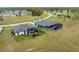 Aerial view of neighboring homes, each with its own private screened-in pool at 16265 Juarez Cir, Punta Gorda, FL 33955