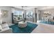 Bright living room with natural light, modern furniture, stylish decor, and open floor plan at 16395 Larocha Dr, Punta Gorda, FL 33955