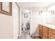 Bathroom features a wood vanity with drawers and a toilet and shower in a separate room at 175 Kings Hwy # 538, Punta Gorda, FL 33983