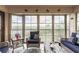Relaxing lanai with comfortable seating and a scenic view, ideal for enjoying the outdoors at 175 Kings Hwy # 538, Punta Gorda, FL 33983