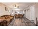 Open-concept living area featuring wood-look floors that connect the living space at 175 Kings Hwy # 538, Punta Gorda, FL 33983