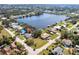 Wide aerial view of the property highlighting the beautiful waterfront location, surrounding landscape, and proximity to the community at 18379 Meyer Ave, Port Charlotte, FL 33948