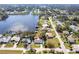 Aerial view of a charming single Gathering home close to the water with lush landscaping at 18379 Meyer Ave, Port Charlotte, FL 33948