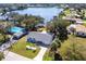 Overhead view of a well-maintained home featuring a pool, landscaping and easy access to the water at 18379 Meyer Ave, Port Charlotte, FL 33948