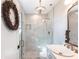 Elegant bathroom featuring a marble shower and modern vanity at 18379 Meyer Ave, Port Charlotte, FL 33948