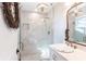 Modern bathroom showcasing white marble shower and classic gold accents at 18379 Meyer Ave, Port Charlotte, FL 33948