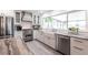 Modern kitchen boasts stainless steel appliances, granite countertops, and ample cabinet space at 18379 Meyer Ave, Port Charlotte, FL 33948