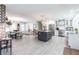 Bright and spacious kitchen featuring a large center island, stainless appliances, and white cabinetry at 18379 Meyer Ave, Port Charlotte, FL 33948