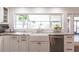 Modern kitchen sink with stainless steel appliances and ample cabinet space at 18379 Meyer Ave, Port Charlotte, FL 33948