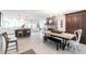 Bright, open living room with a brick fireplace, wood floors, and modern finishes at 18379 Meyer Ave, Port Charlotte, FL 33948