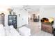 Bright living room with white furnishings, light wood floors, and an open layout at 18379 Meyer Ave, Port Charlotte, FL 33948