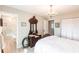 Bright bedroom with elegant chandelier, closet and en suite at 18379 Meyer Ave, Port Charlotte, FL 33948