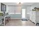 Dining area with abundant natural light and comfortable seating near windows at 21287 Gertrude Ave # 106, Port Charlotte, FL 33952