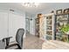 Well-lit home office with ample storage, stylish decor, and convenient access to the bathroom at 21287 Gertrude Ave # 106, Port Charlotte, FL 33952