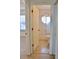 Bathroom view highlighting tiled floors, a tub, and sliding shower doors at 21332 Walling Ct, Port Charlotte, FL 33954