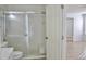 Bright bathroom featuring a sliding glass door shower at 21332 Walling Ct, Port Charlotte, FL 33954