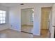 A cozy bedroom with tile floors, mirrored closet doors and a window at 21332 Walling Ct, Port Charlotte, FL 33954