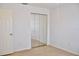 Bright bedroom featuring tile floors and closet with mirrored doors at 21332 Walling Ct, Port Charlotte, FL 33954