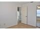 Bedroom featuring tile flooring and a closet view into another room at 21332 Walling Ct, Port Charlotte, FL 33954